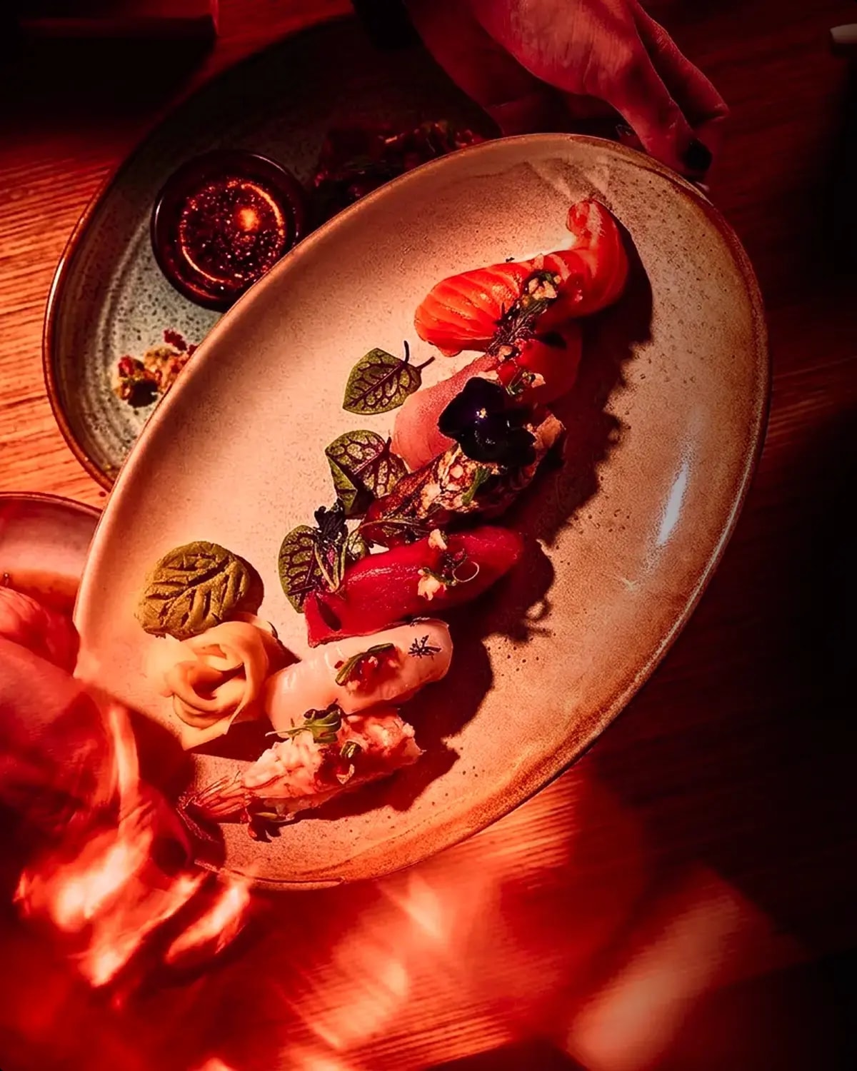 Artfully plated sushi and sashimi served at AKA Restaurant
